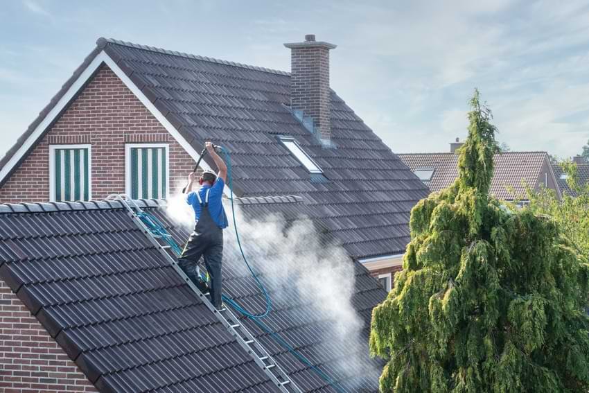 Cleaning Roof Man