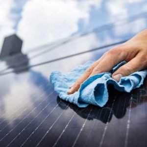 Hand Cleaning a Solar Panel